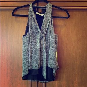 Bishop + Young front tie black-slit sleeveless top